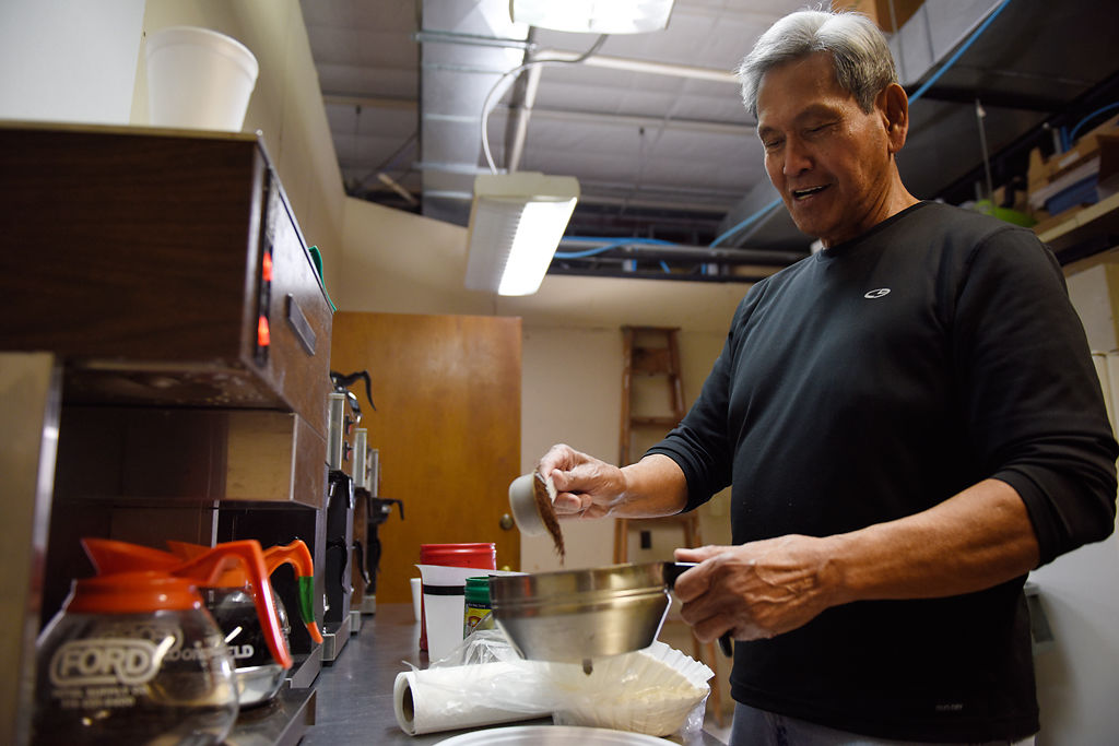 Tony Antonio starts a fresh batch of coffee